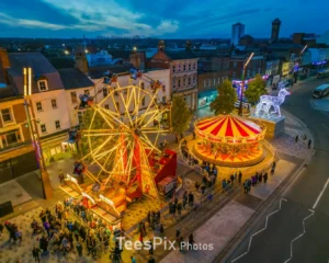 Stockton Sparkles Victorian Funfair showing a Ferris wheel and carousel